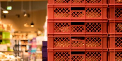 Red,Bread,Crates,Stacked,In,A,Supermarket. Red,Bread,Crates,Stacked,In,A,Supermarket.